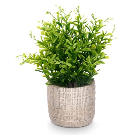 Planta artificial en maceta clara