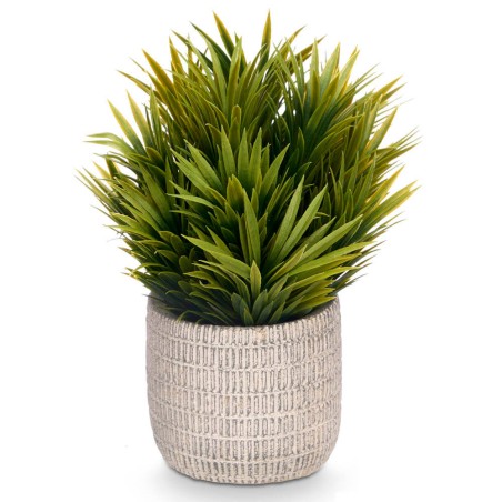 Planta artificial en maceta clara